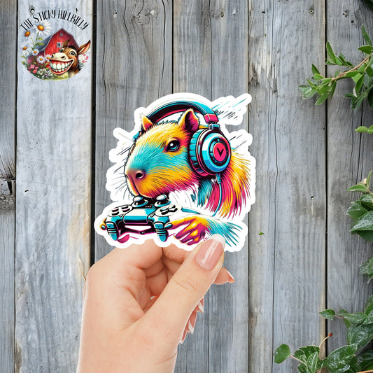 Vibrant Gamer Capybara Sticker | Laminated Vinyl Decal | Funny Gift Stickers | Multiple Sizes | Perfect for Laptops, Cars, Tumblers and More!